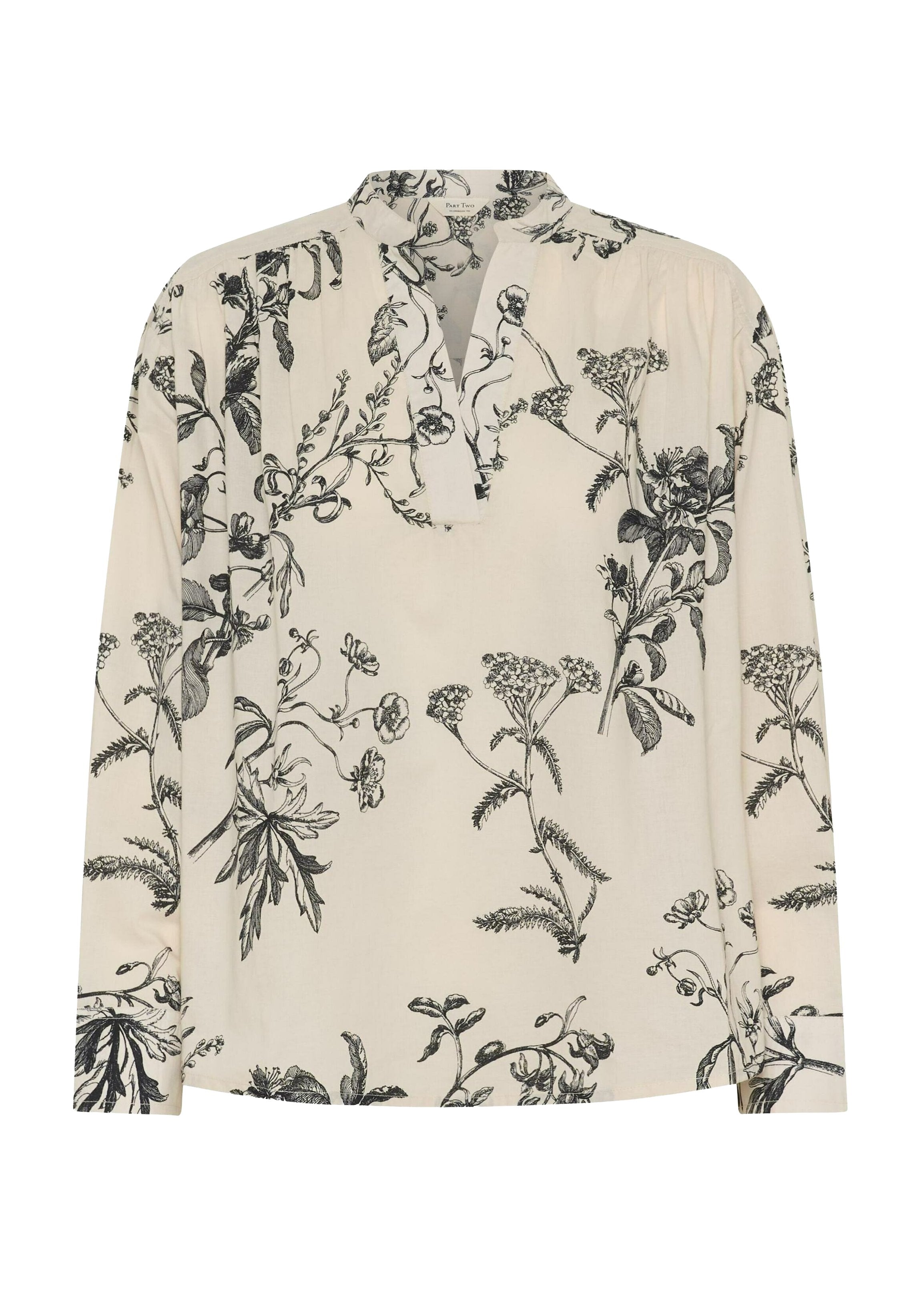 Langärmlige Bluse aus cremefarbenem Stoff mit schwarzem Blumendruck. Entworfen mit einem klassischen Kragen und Falten-Detail am Ausschnitt.