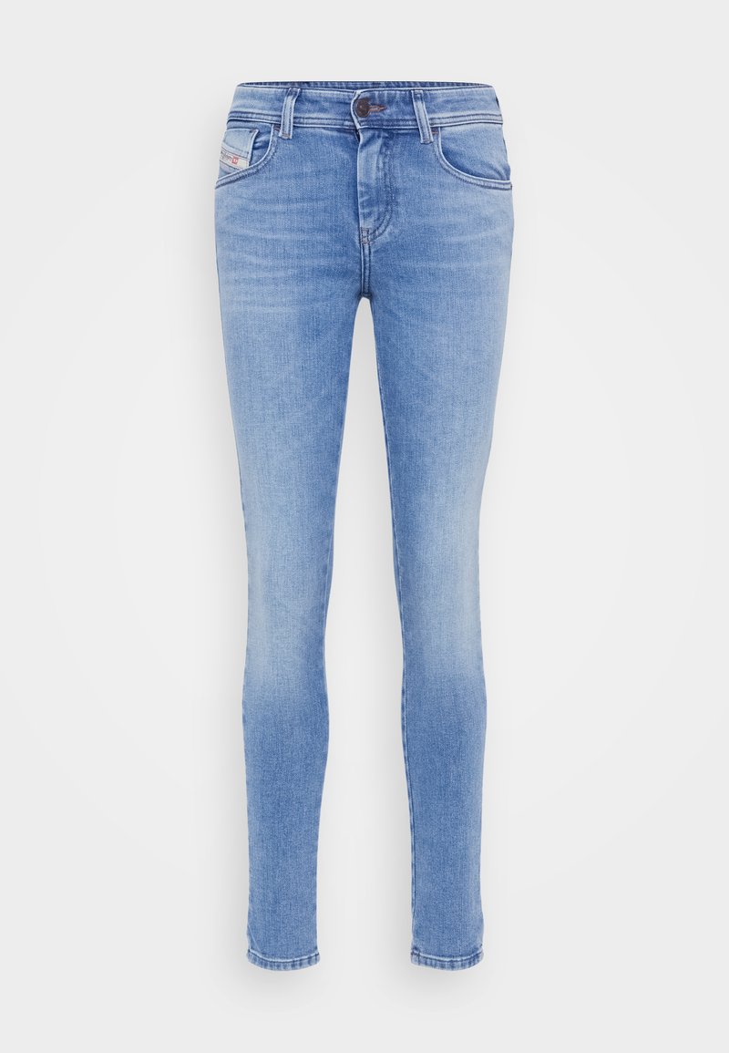 Hellblaue Skinny-Jeans aus Denim, mit einem klassischen Fünf-Taschen-Design und einem Reißverschluss mit Knopfverschluss. Glatte Textur.