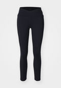 Schwarze Leggings mit einem hohen, gekreuzten Bund. Hergestellt aus elastischem Stoff mit dezenten Nähdetails. Eng anliegendes Design.