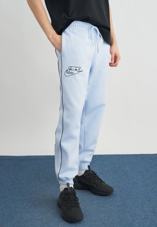 Nike Sportswear Tracksuit bottoms - hydrogen blue/black