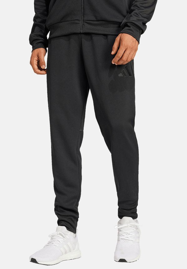 adidas Performance FUSSBALL - TEAMSPORT  TIRO 25 TRAVEL JOGGING - Tracksuit bottoms - schwarz