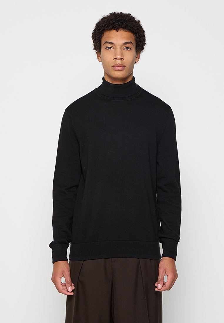 Schwarzer Rollkragenpullover mit langen Ärmeln, gerippter Textur und enganliegenden Bündchen. Schlichtes Design, aus weichem Stoff für Komfort gefertigt.