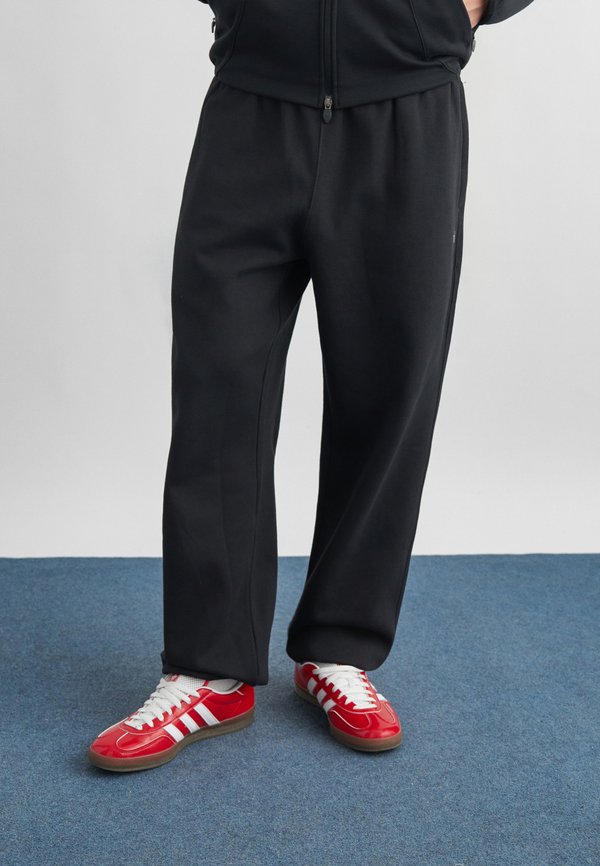 adidas Originals LOOSE - Tracksuit bottoms - black