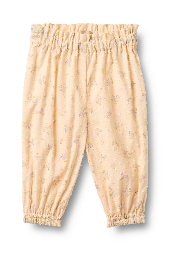 Hellgelbe Blumenhose mit einem elastischen Bund, gerafften Bündchen und einem strukturierten Stoff mit kleinen erhabenen Punkten und pastellfarbenen Blumenmustern.