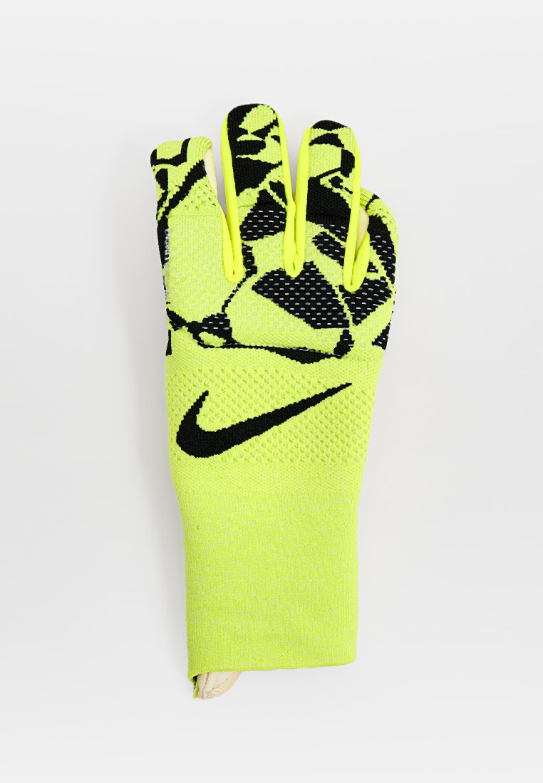 Gelbe und schwarze Nike-Sporthandschuhe mit geometrischen Mustern und Logo, entworfen für Handschutz und Grip.