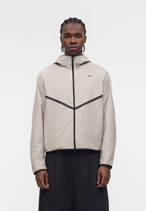 Nike Sportswear M NK TECH SHORI KNIT WR FZ JKT - Training jacket - college grey/black
