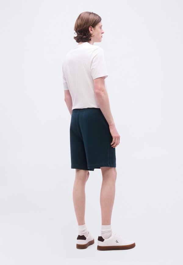 Calvin Klein NANO STANDARD LOGO MONOGRAM