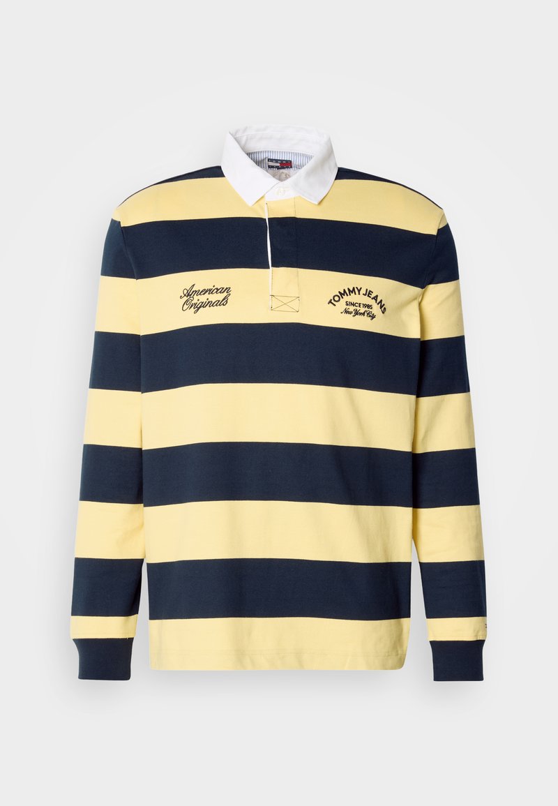 Baumwoll-Rugbyshirt mit marineblauen und gelben horizontalen Streifen, weißem Kragen, bestickten "Tommy Jeans"- und "American Originals"-Logos.