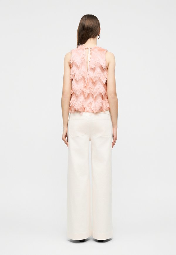 DESIGNERS REMIX LOTUS