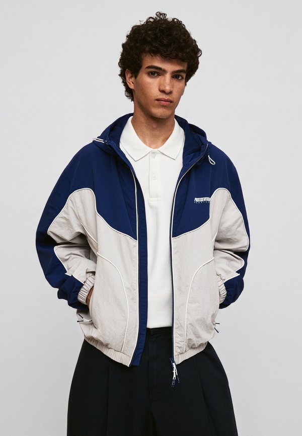 Bershka HOODED - WINDBREAKER - Summer jacket - royal blue