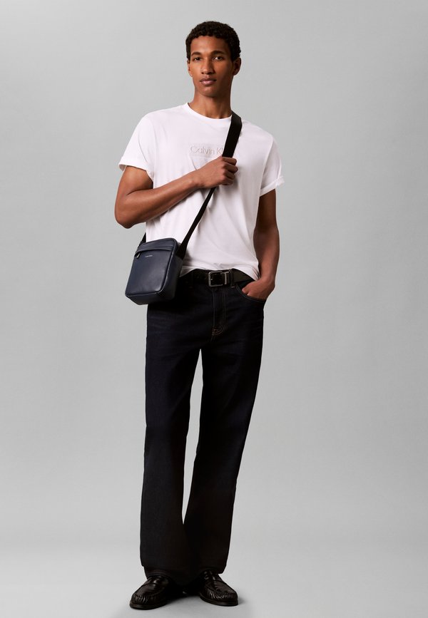 Calvin Klein RAISED REPORTER - Cross body bag - dark blue