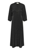 Schwarzes Midikleid mit strukturiertem Leopardenmuster, rundem Ausschnitt, Knopfschluss und dreiviertellangen Ärmeln. Weicher, leichter Stoff.