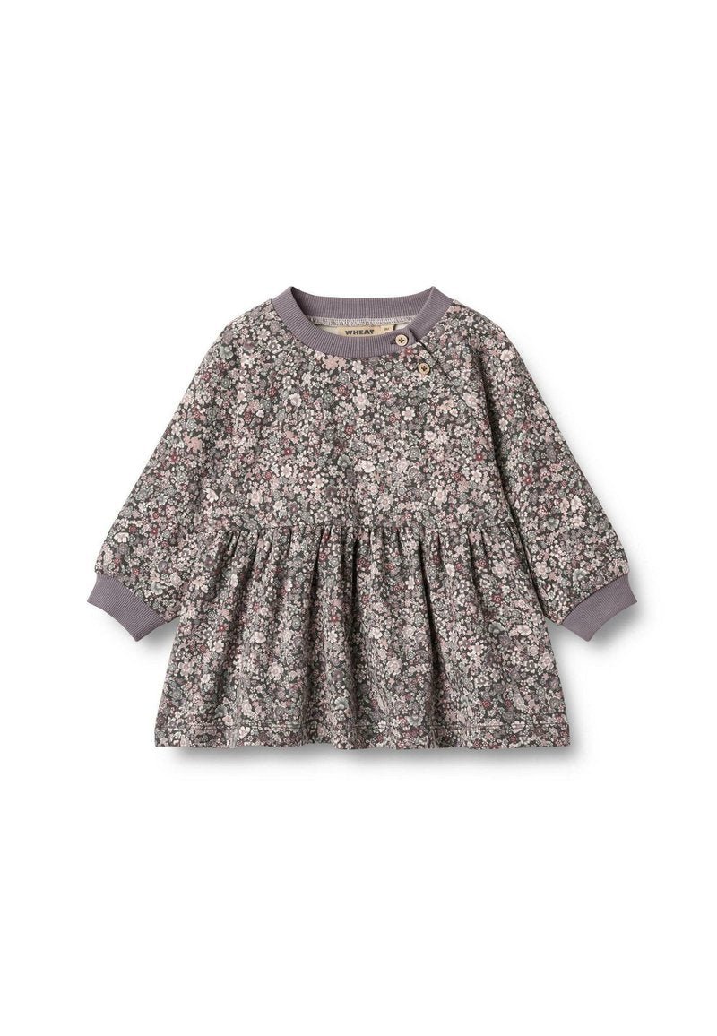 Blumengemustertes Kleid in Grau mit langen Ärmeln, rundem Hals und plissiertem Rock. Mit Knopfdetails und dehnbaren Bündchen.