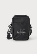 Calvin Klein BOLD LOGO SLIM REPORTER - Cross body bag - black