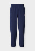Marineblaue Sporthose mit elastischem Bund und Bündchen, geradem Schnitt und kleinem Logo an der oberen linken Oberschenkelseite.