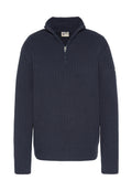 Marineblauer gerippter Pullover mit einem Viertel-Reißverschluss am Kragen, langen Ärmeln und strukturiertem Stoff. Verfügt über ein kleines Etikett am linken Ärmel.