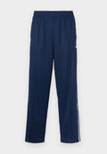 adidas Originals FIREBIRD OVERSIZED FIT UNISEX - Tracksuit bottoms - night indigo