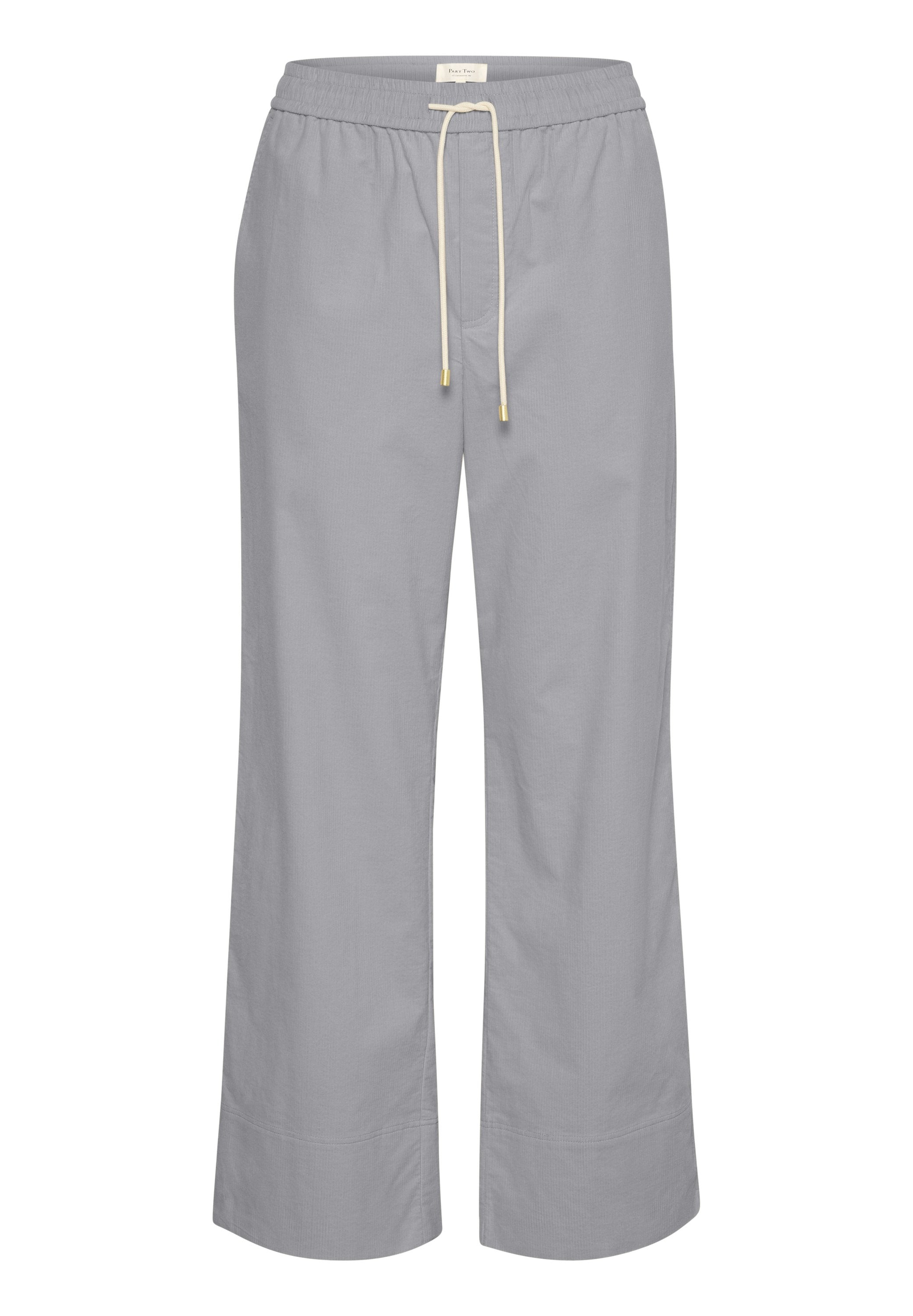 Helle graue, weite Hosen aus weichem Baumwollstoff, mit einem elastischen Bund und Kordelzug mit goldenen Spitzen.
