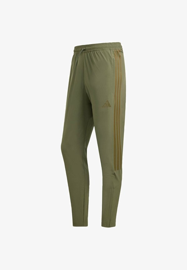 adidas Sportswear HOUSE OF TIRO - Tracksuit bottoms - olive strata colored reflective