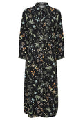 Schwarzes, blumiges Kleid mit einem Kragen, das vorne mit Knöpfen versehen ist. Der Stoff zeigt farbenfrohe Pflanzenmuster in Grün, Orange und Blau.