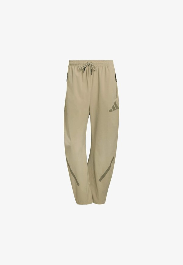 adidas Sportswear ADIDAS Z.N.E. WOVEN - Tracksuit bottoms - beige