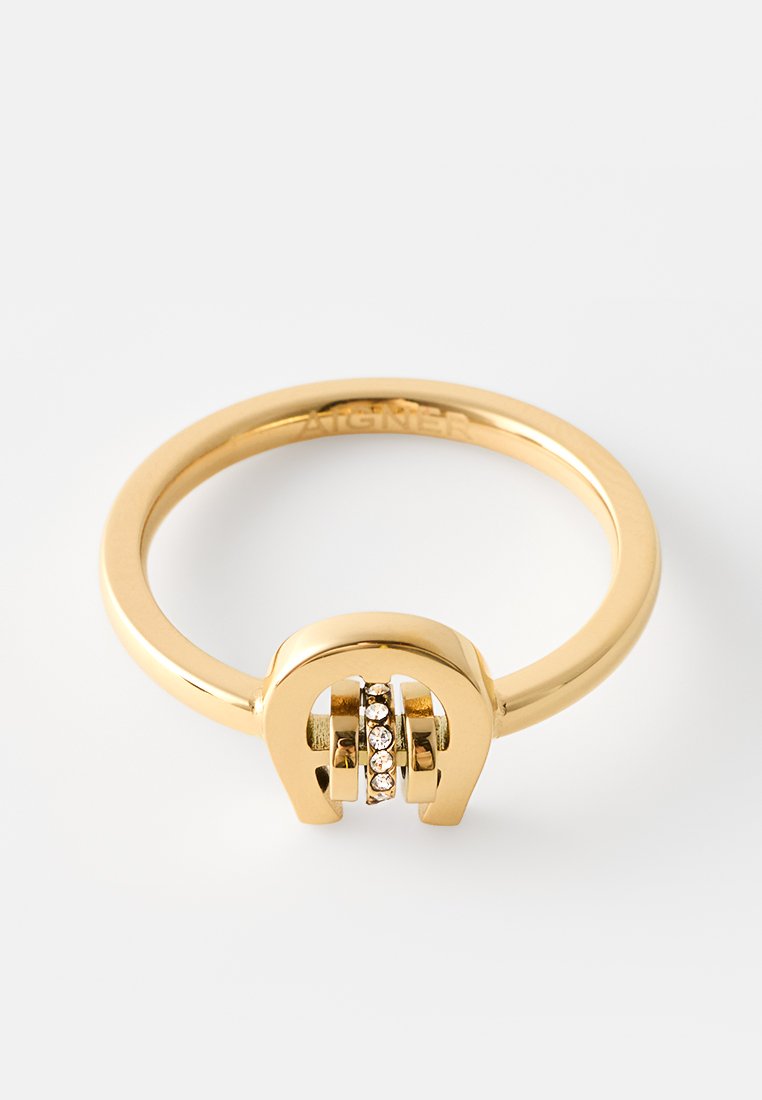 Goldring mit Hufeisenform, der eine mittlere Reihe kleiner klarer Edelsteine auf weißem Hintergrund zeigt.