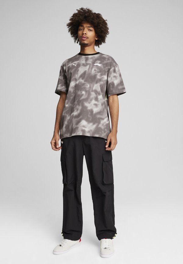 Puma STATEMENT  PANTS - Cargo trousers - black
