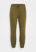 Olivgrüne Jogginghosen aus weichem Stoff, mit einem elastischen Bund mit Kordelzug, zwei Fronttaschen und elastischen Bündchen.