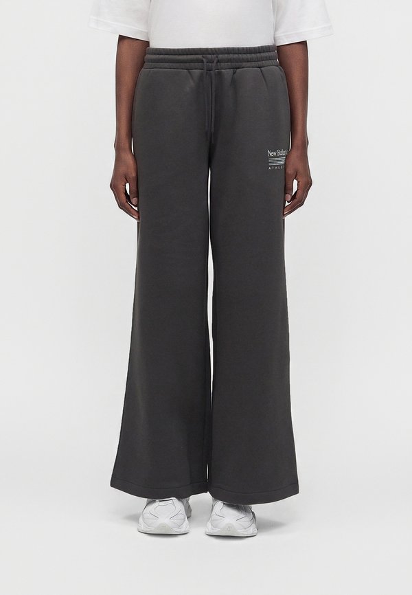 New Balance TRACKSIDE - Tracksuit bottoms - black cement