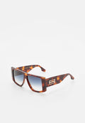 Schildpatt rechteckige Sonnenbrille mit blauen Verlaufslinsen und goldenem Emblem an den breiten Bügeln, auf weißem Hintergrund präsentiert.