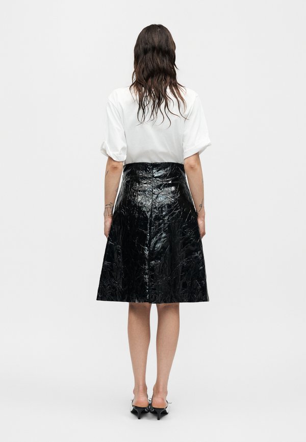 A.W.A.K.E. MODE KNEE LENGTH SKIRT