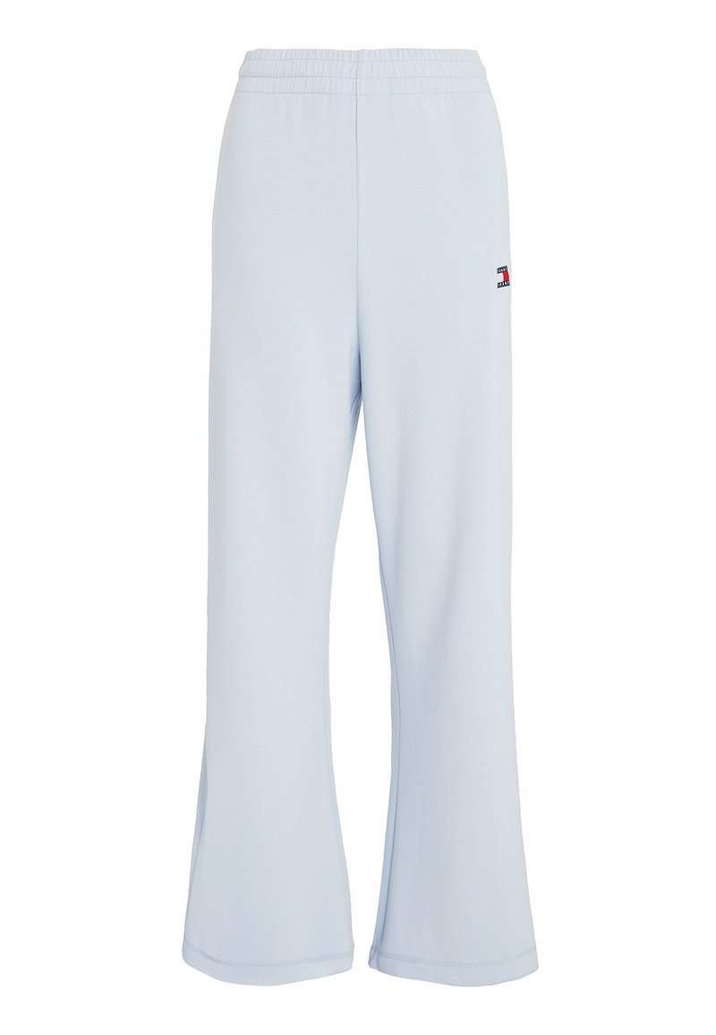 Hellblaue Sweatpants mit lockerer Passform, ausgestattet mit einem elastischen Bund und einem kleinen Logo-Akzent an der Seite. Hergestellt aus weichem, dehnbarem Material.