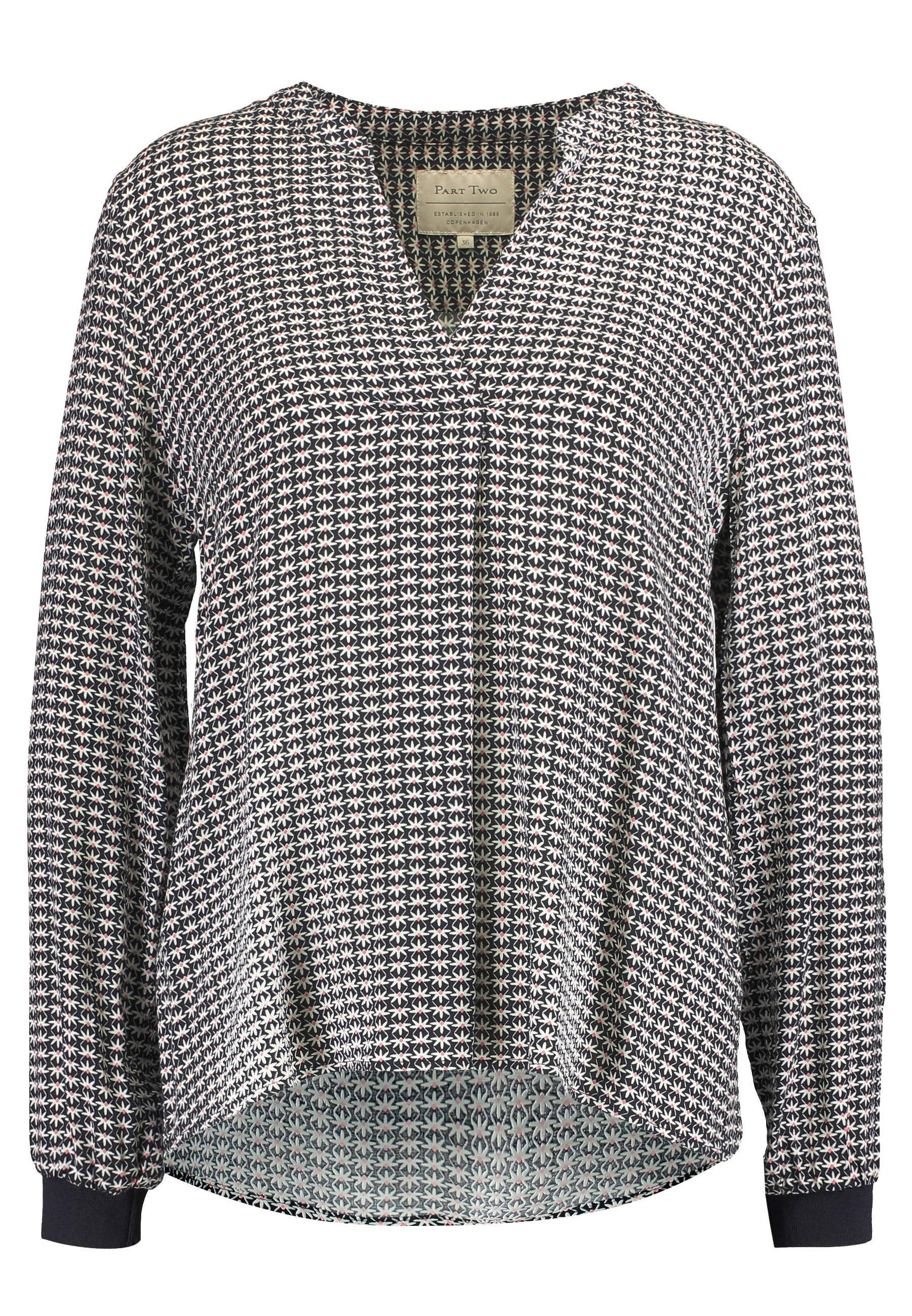 Langärmlige Bluse mit dunklem Muster und wiederholtem Blumenmuster in Weiß, Rot und Blau. Sie verfügt über einen V-Ausschnitt und eine lockere Passform.