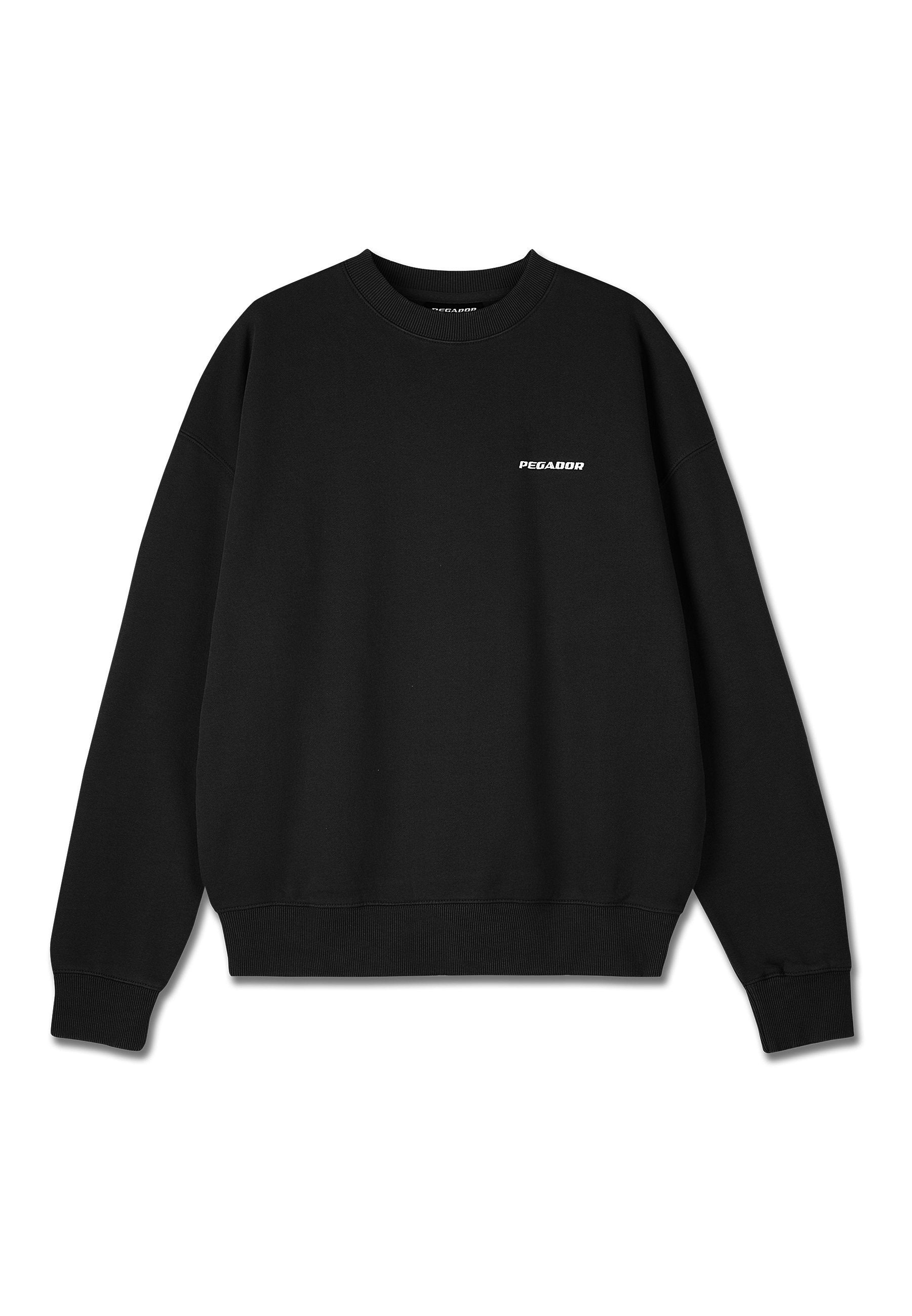 Schwarzer Sweatshirt aus Baumwollmischgewebe, mit Rundhalsausschnitt, gerippten Bündchen und Saum, sowie weißem "PEGADOR"-Logo auf der Brust.