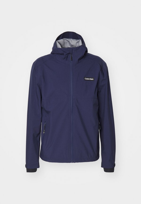 Calvin Klein Golf FEATHER DRY WATERPROOF SHELL JACKET - Waterproof jacket - navy