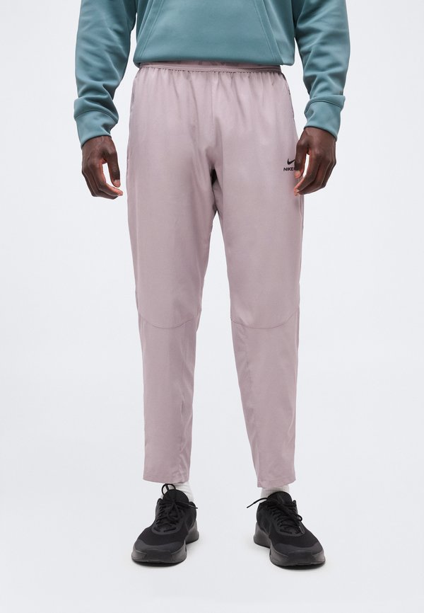 Nike Performance M NP DF NPT PANT - Tracksuit bottoms - light violet ore/black