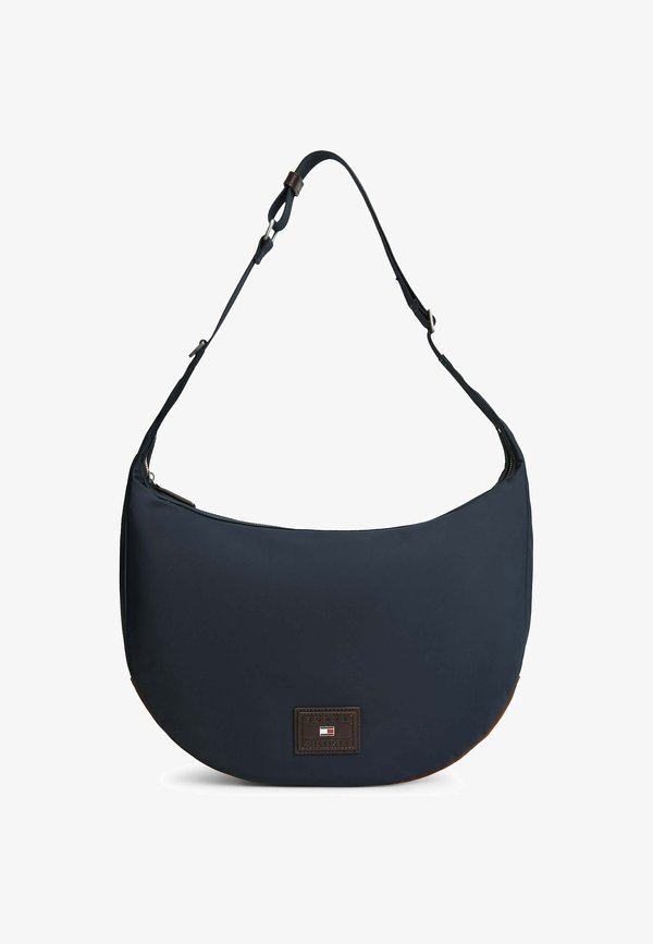 Tommy Hilfiger TOMMY HILFIGER HERITAGE LOGO PATCH SLOUCH CROSSBODY BAG - Cross body bag - space blue