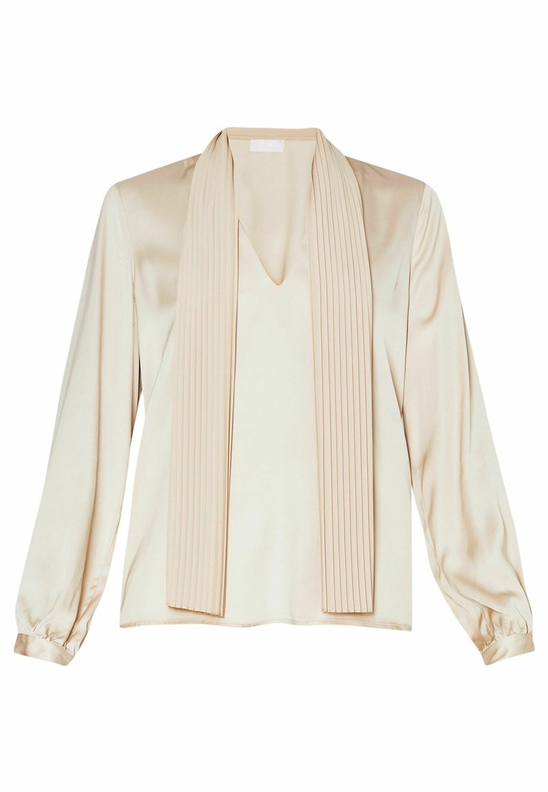 Beige Satinbluse mit langen Ärmeln, V-Ausschnitt und vorn gefaltetem Detail, mit gerafften Bündchen und glatter Textur.