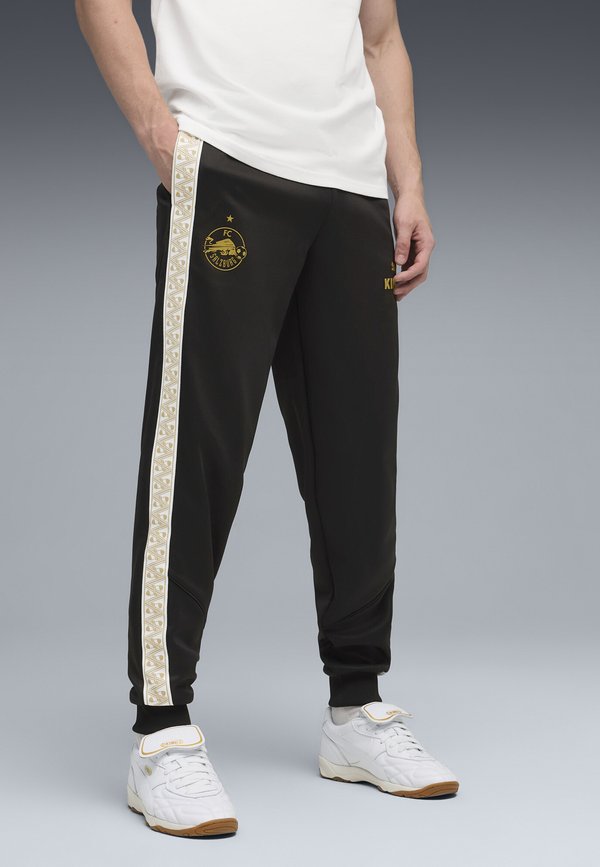 Puma Tracksuit bottoms - black-matte  gold