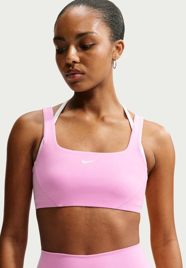 Nike Performance W NK1 DF STRAPPY PAD BRA E+ - Light support sports bra - pink rise/white