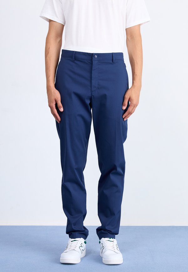 New Balance ATHLETICS STANDARD TAPERED PANT  - Trousers - navy