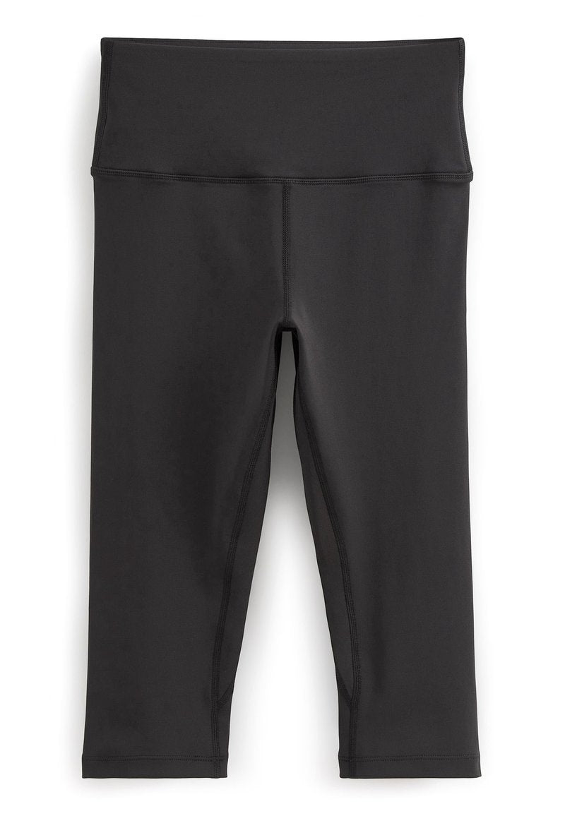 Schwarze Capri-Leggings aus glattem, elastischem Stoff. Mit einem breiten, hohen Bund und flachen Nähten für Komfort und Langlebigkeit.