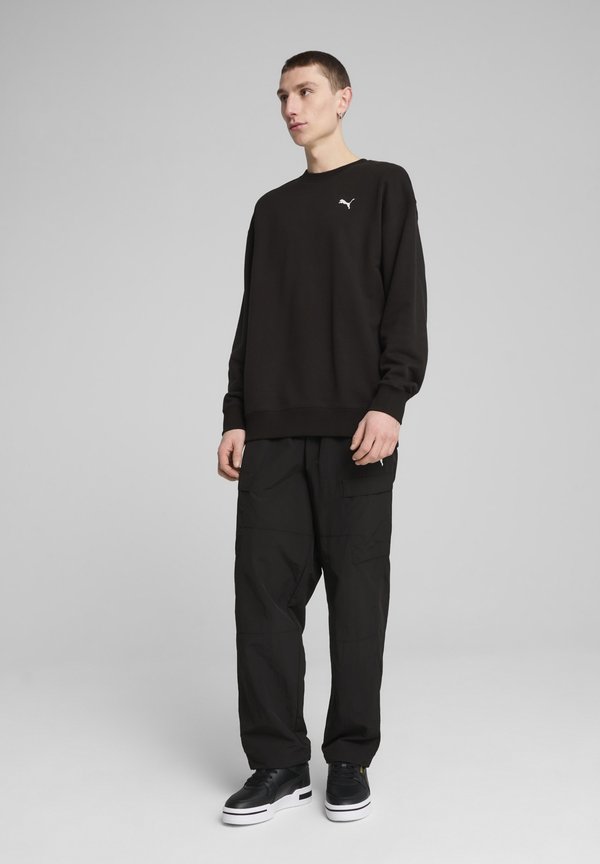 Puma WARDROBE ESS RELAXED RUNDHALS - Sweatshirt - black