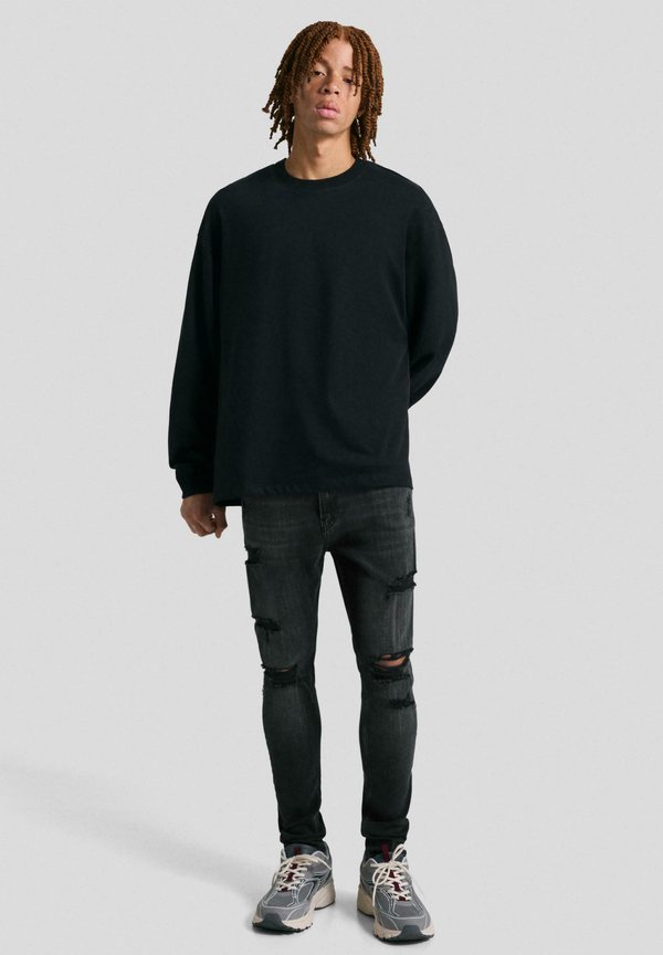 Bershka Slim fit jeans - black