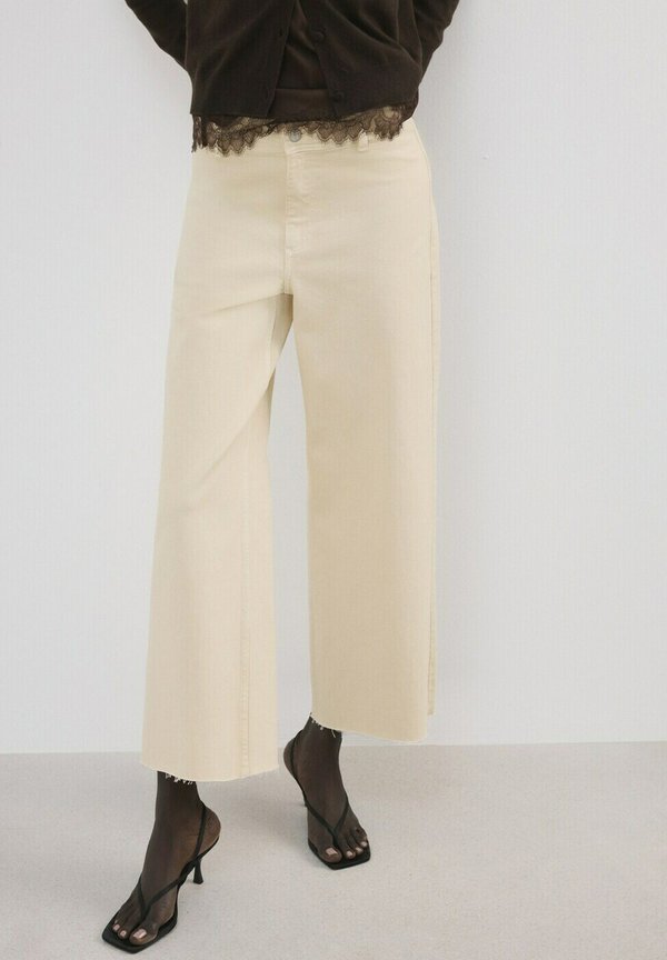 Mango ADULT - Flared Jeans - beige