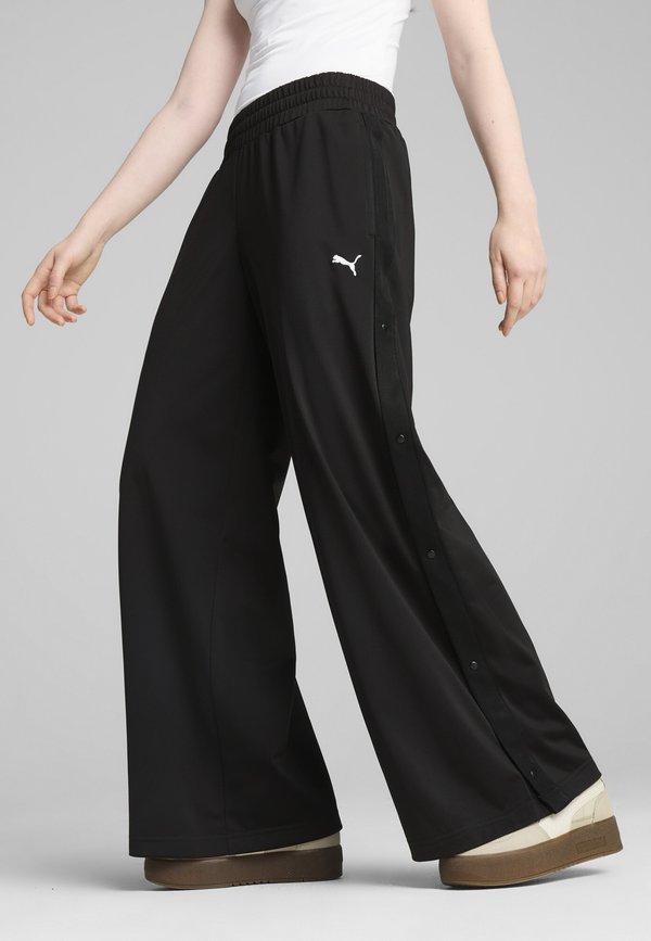 Puma LOW RISE - Trousers - black