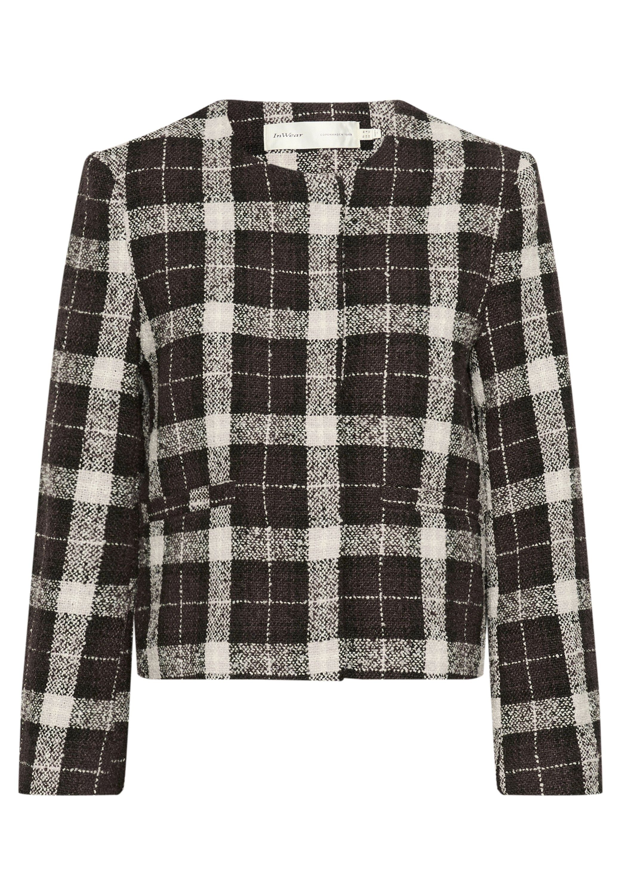 Schwarz-weißer kariierter Blazer aus strukturiertem Stoff, mit langen Ärmeln, einer gekürzten Passform und schlanker Silhouette. Mit Fronttaschen.