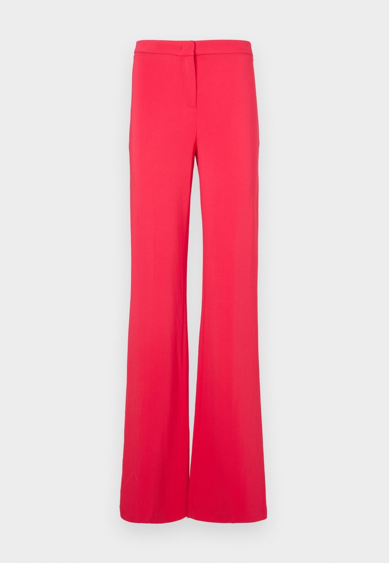 Weite Hosen in leuchtendem Pink, aus einem glatten, leichten Stoff. Der Bund verfügt über einen Knopfverschluss und ein flaches Design.