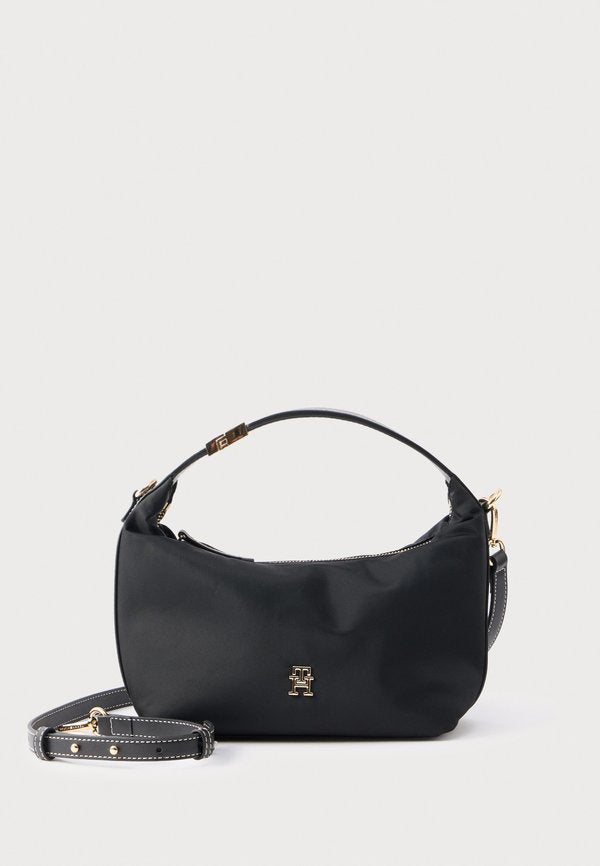 Tommy Hilfiger TH MONOGRAM PLAQUE CROSSBODY BAG - Handbag - black