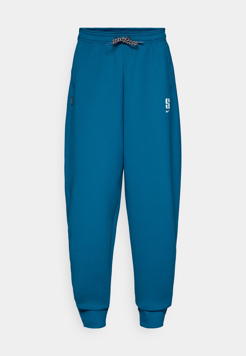 Teal Jogginghosen aus weichem Stoff, mit elastischem Bund und Kordelzug, seitlichen Taschen und einem bedruckten Logo auf dem linken Oberschenkel.